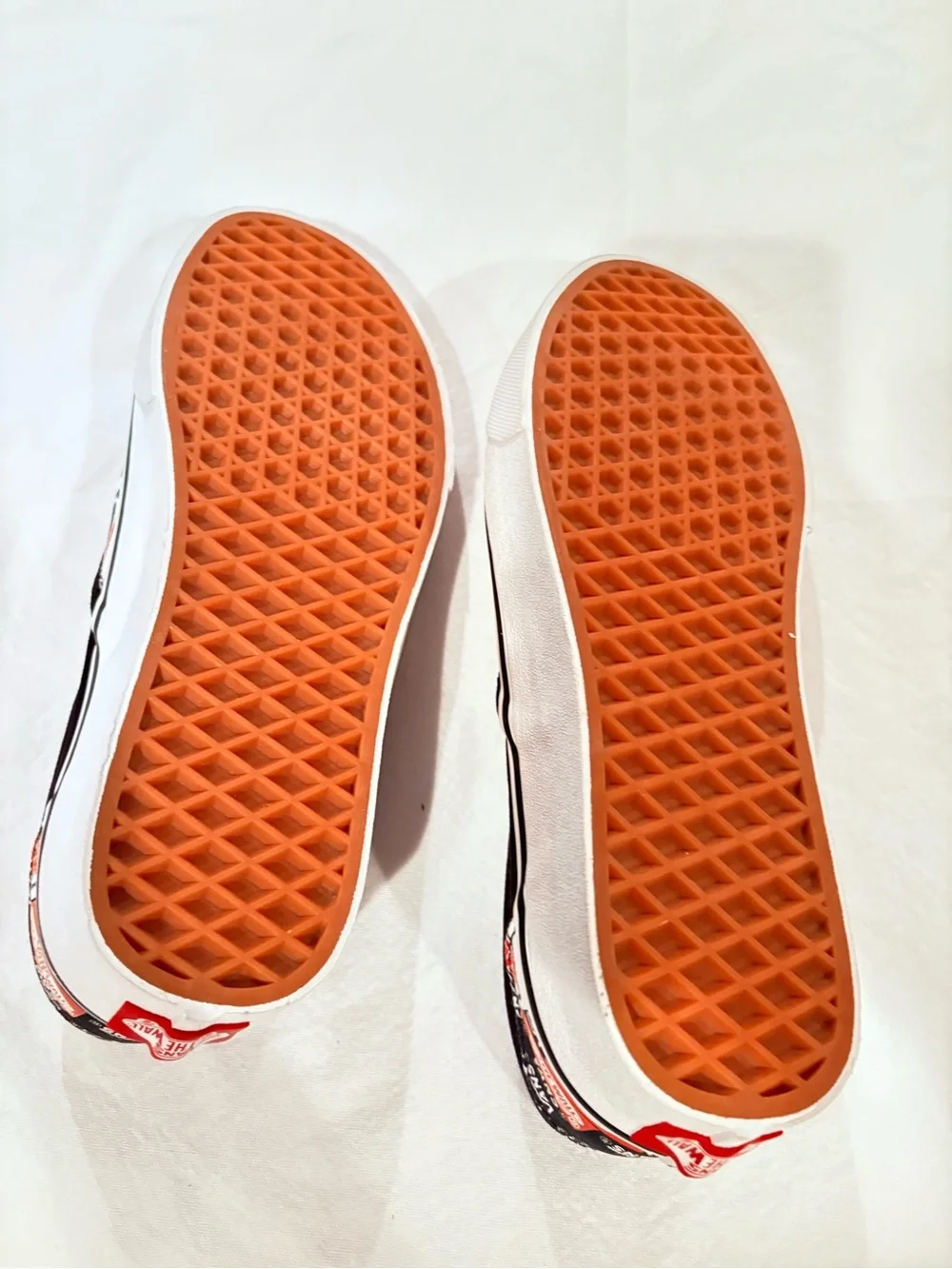 Vans Slip-On Sticker Patch Print in Black, White & Red